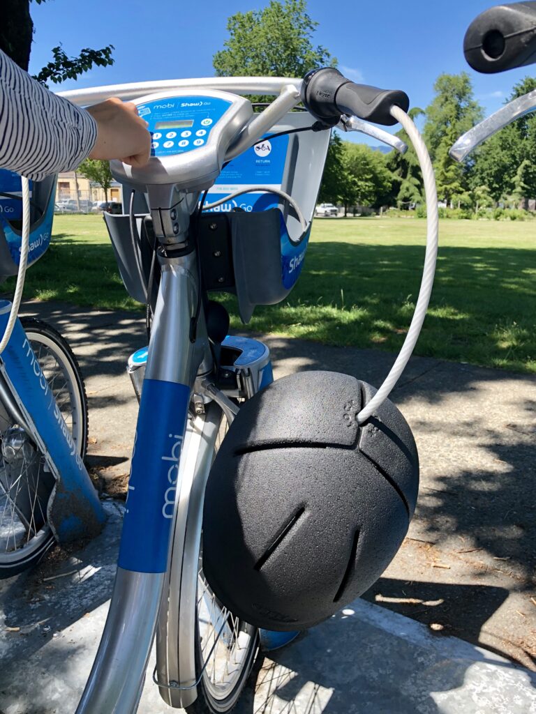 The new HOPR helmet makes it easy for scooter share and bike share programs to include helmet
